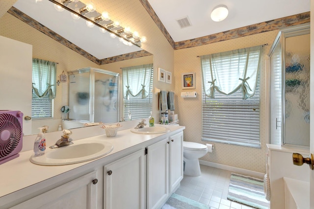 12697 Coral Breeze Dr, Wellington, FL 33414 - bathroom featuring wallpapered walls, double vanity, tile patterned floors, a stall shower, and toilet