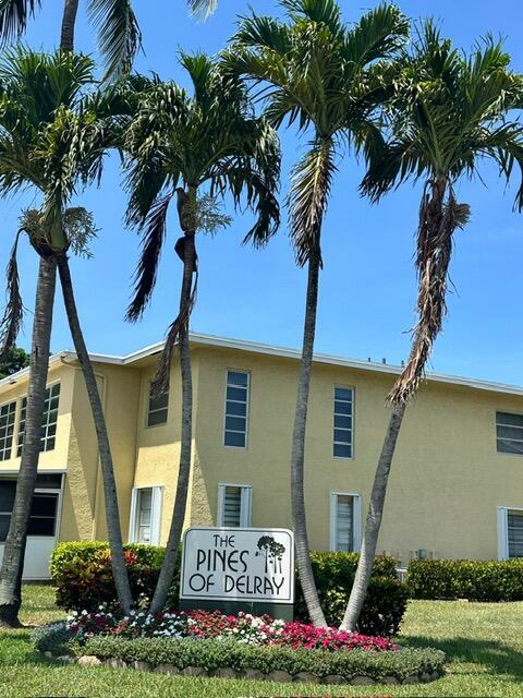 1120 Mahogany Way Unit 204, Delray Beach, FL 33445 - community sign featuring a yard