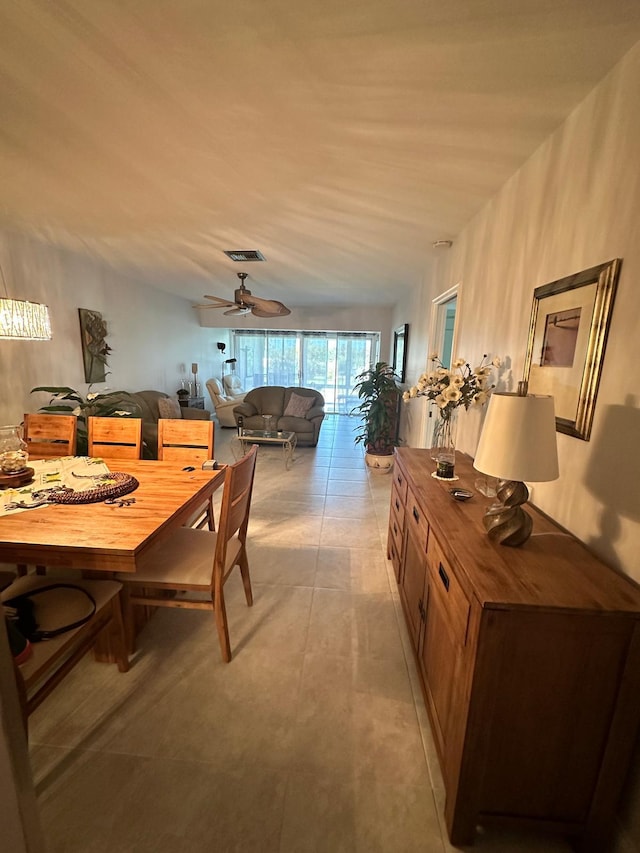 1120 Mahogany Way Unit 204, Delray Beach, FL 33445 - dining room with vaulted ceiling and a ceiling fan
