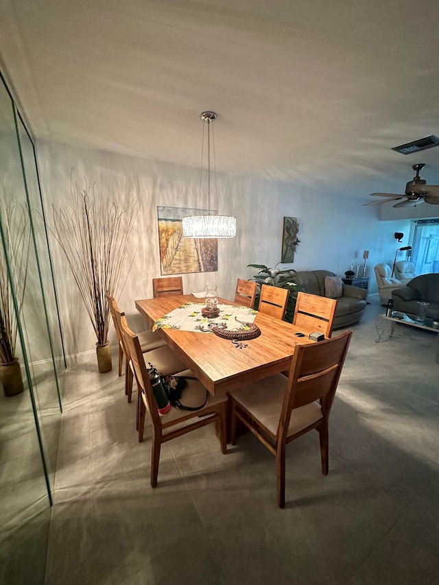 1120 Mahogany Way Unit 204, Delray Beach, FL 33445 - dining room with a chandelier and ceiling fan