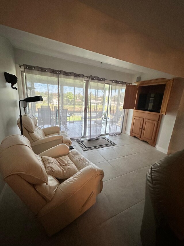 1120 Mahogany Way Unit 204, Delray Beach, FL 33445 - living room with light tile patterned floors