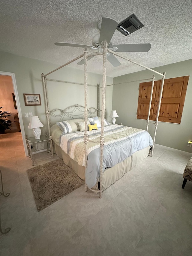 1120 Mahogany Way Unit 204, Delray Beach, FL 33445 - bedroom featuring a ceiling fan and a textured ceiling