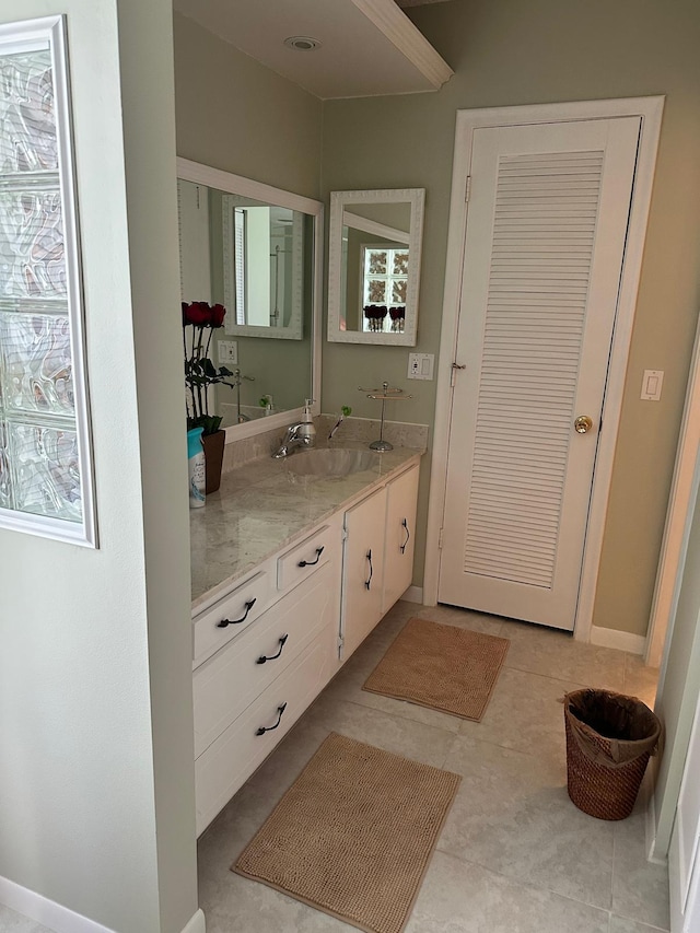1120 Mahogany Way Unit 204, Delray Beach, FL 33445 - bathroom featuring vanity, tile patterned flooring, and plenty of natural light
