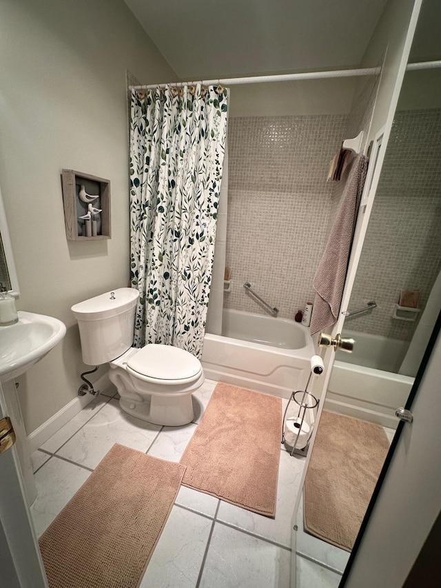 1120 Mahogany Way Unit 204, Delray Beach, FL 33445 - full bathroom featuring shower / tub combo, toilet, marble look tiles, and baseboards