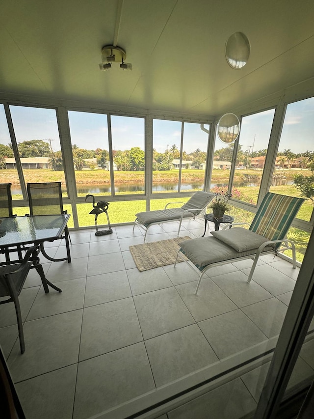 1120 Mahogany Way Unit 204, Delray Beach, FL 33445 - unfurnished sunroom with a water view