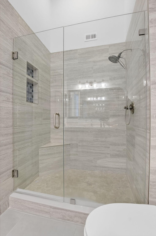 9329 Boca Gardens Cir S Unit D, Boca Raton, FL 33496 - full bath featuring a stall shower and tile patterned flooring