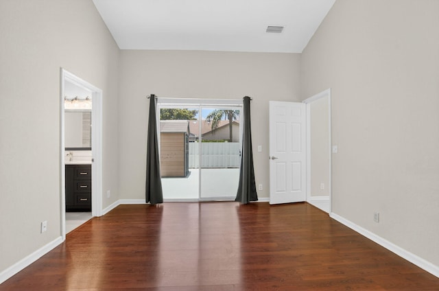9329 Boca Gardens Cir S Unit D, Boca Raton, FL 33496 - spare room with dark wood-type flooring and baseboards