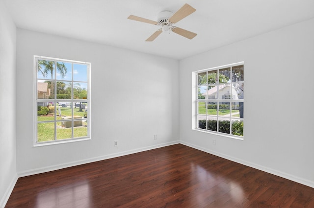 9329 Boca Gardens Cir S Unit D, Boca Raton, FL 33496 - empty room featuring dark wood-style flooring and ceiling fan