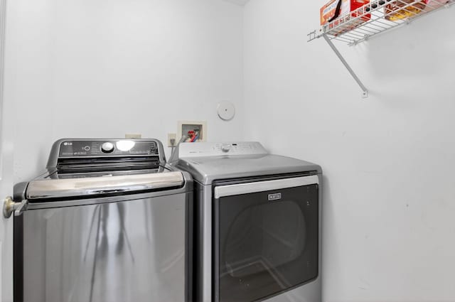 9329 Boca Gardens Cir S Unit D, Boca Raton, FL 33496 - laundry room featuring washer and dryer