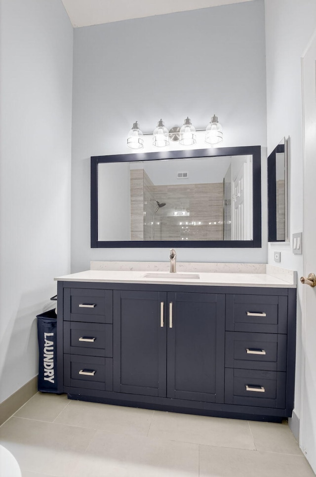 9329 Boca Gardens Cir S Unit D, Boca Raton, FL 33496 - bathroom with vanity, a tile shower, and tile patterned floors