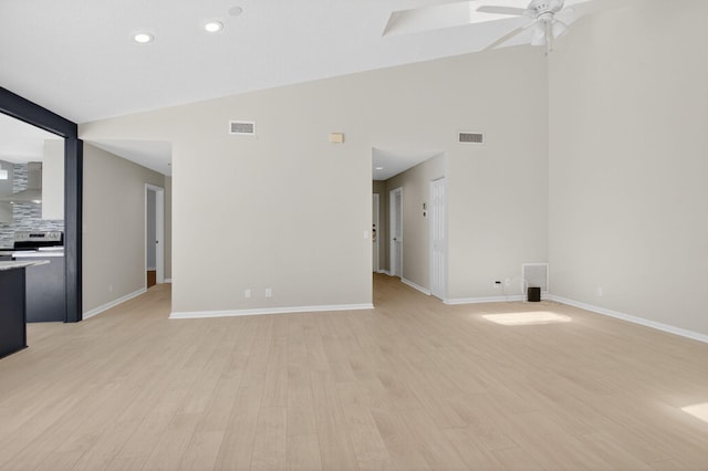 9329 Boca Gardens Cir S Unit D, Boca Raton, FL 33496 - unfurnished living room featuring a ceiling fan, light wood-style flooring, high vaulted ceiling, and recessed lighting