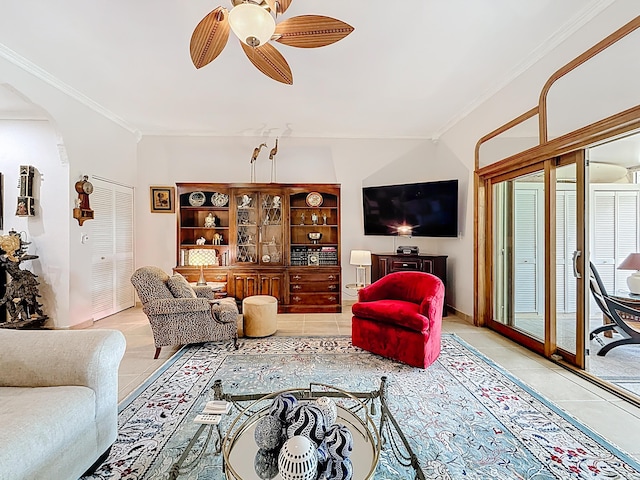3622 Citrus Trce Unit 2, Davie, FL 33328 - tiled living room with ceiling fan, crown molding, and arched walkways