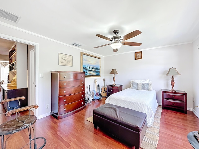 3622 Citrus Trce Unit 2, Davie, FL 33328 - bedroom featuring wood finished floors, crown molding, baseboards, and ceiling fan