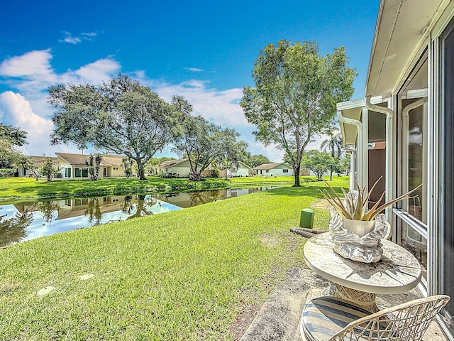 3622 Citrus Trce Unit 2, Davie, FL 33328 - view of green lawn featuring a water view and a residential view