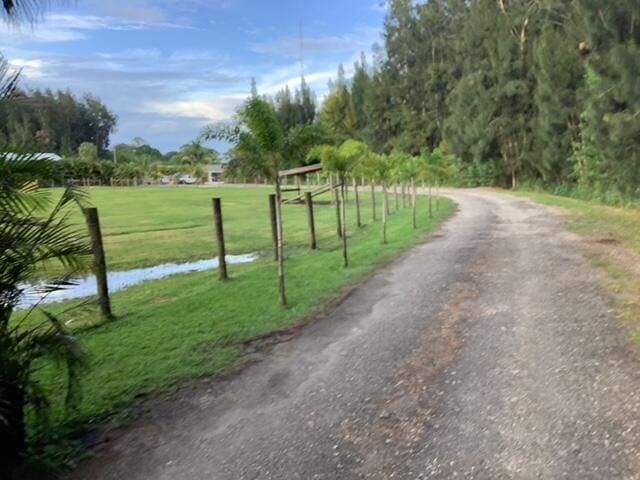 1210 Hartman Rd, Fort Pierce, FL 34947 - view of road featuring a water view