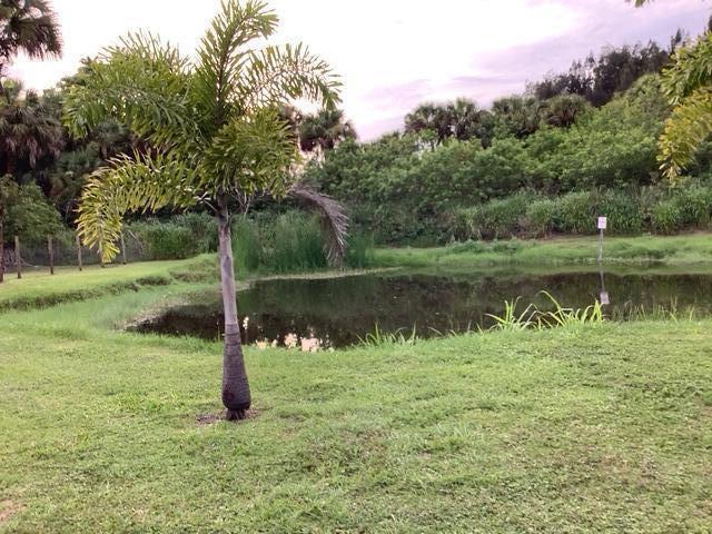 1210 Hartman Rd, Fort Pierce, FL 34947 - view of green lawn