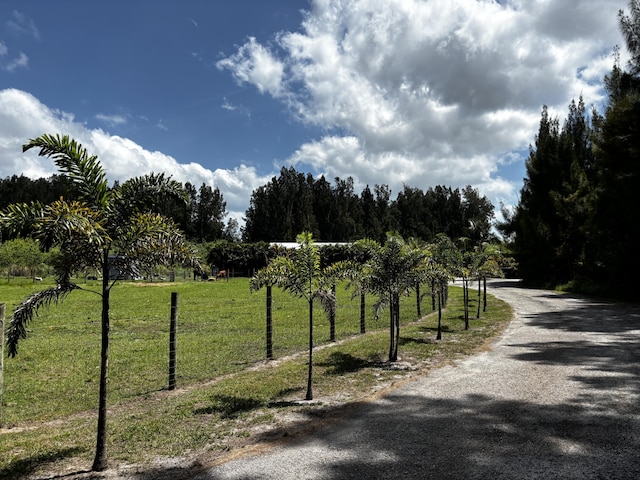 1210 Hartman Rd, Fort Pierce, FL 34947 - view of asphalt road with a rural view