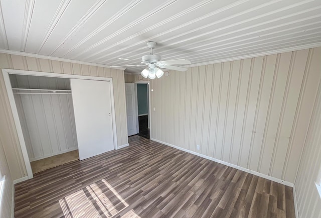 2818 Alabama St, West Palm Beach, FL 33406 - unfurnished bedroom with a closet, wood finished floors, baseboards, ceiling fan, and crown molding