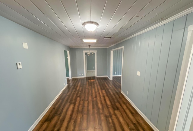 2818 Alabama St, West Palm Beach, FL 33406 - hallway featuring dark wood-type flooring, baseboards, and ornamental molding
