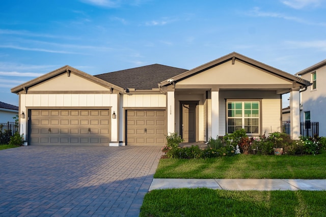 1130 Tangled Orchard Trce, The Acreage, FL 33470 - ranch-style house with an attached garage, driveway, stucco siding, and roof with shingles