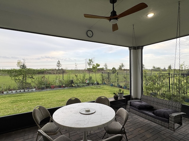 1130 Tangled Orchard Trce, The Acreage, FL 33470 - sunroom featuring ceiling fan