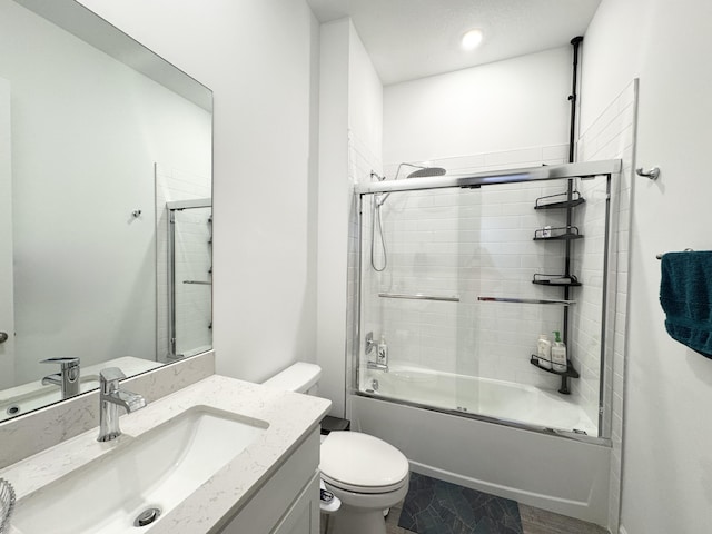 1130 Tangled Orchard Trce, The Acreage, FL 33470 - full bath with toilet, vanity, and enclosed tub / shower combo