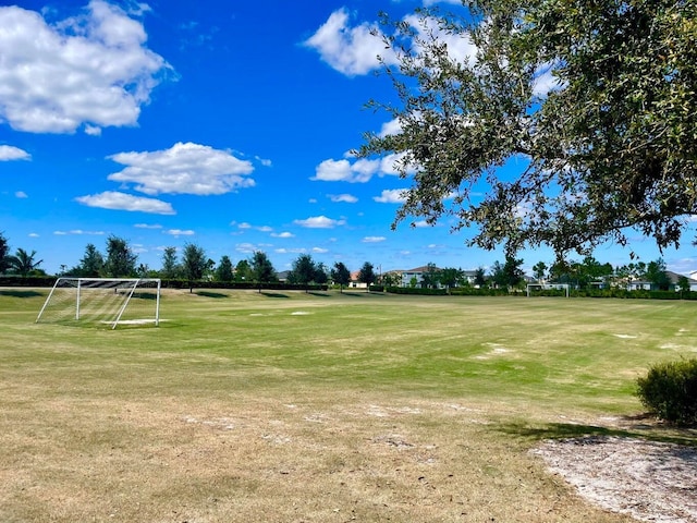1130 Tangled Orchard Trce, The Acreage, FL 33470 - view of community with a sport area and golf course view