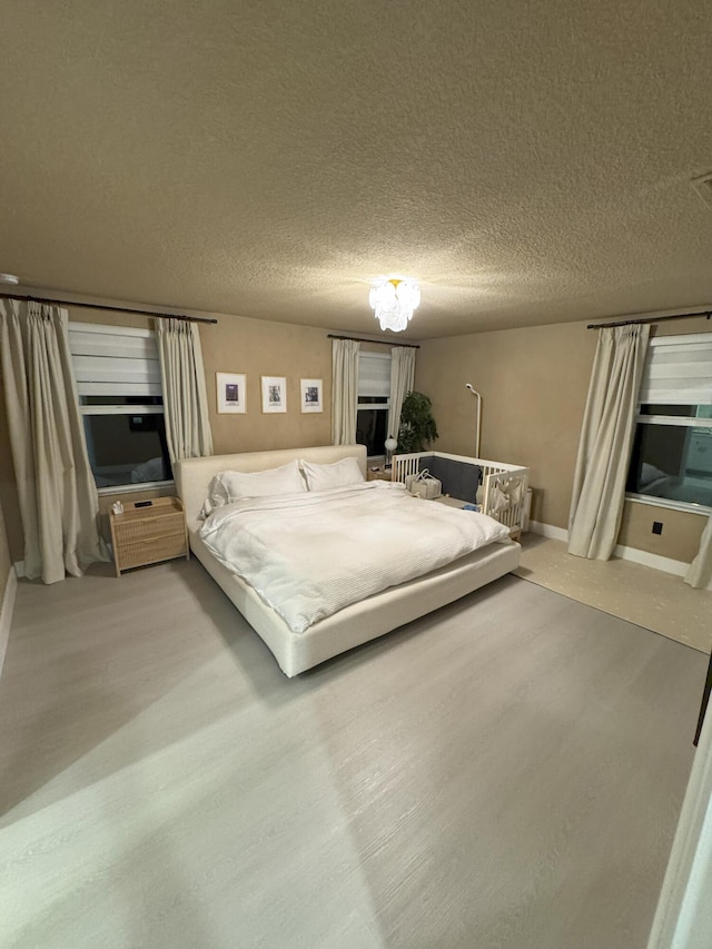 5700 Mentmore Dr, Mangonia Park, FL 33407 - bedroom with a textured ceiling
