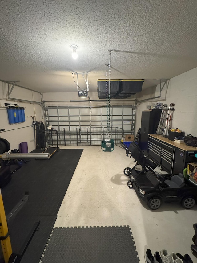 5700 Mentmore Dr, Mangonia Park, FL 33407 - garage featuring a garage door opener