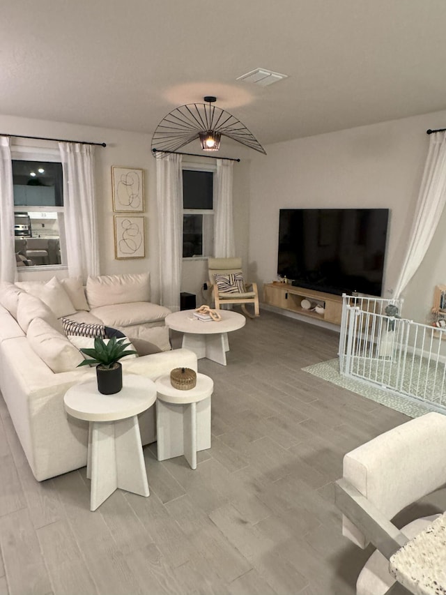 5700 Mentmore Dr, Mangonia Park, FL 33407 - living room with wood finished floors