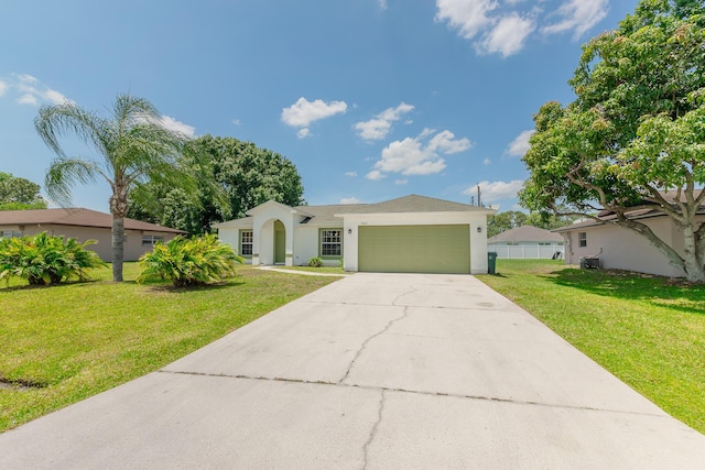 545 SW Buswell Ave, Port Saint Lucie, FL 34983 - ranch-style home featuring an attached garage, stucco siding, and concrete driveway