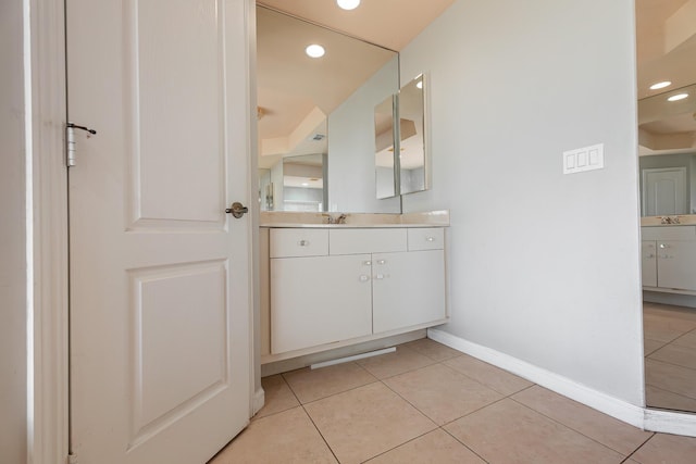 1501 SW Kamchatka Ave, Port Saint Lucie, FL 34953 - bathroom with vanity, tile patterned floors, and recessed lighting