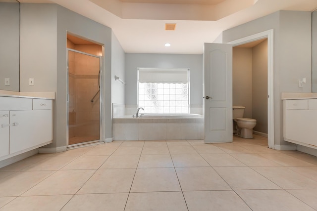 1501 SW Kamchatka Ave, Port Saint Lucie, FL 34953 - full bath with tile patterned flooring, vanity, a garden tub, a shower stall, and recessed lighting