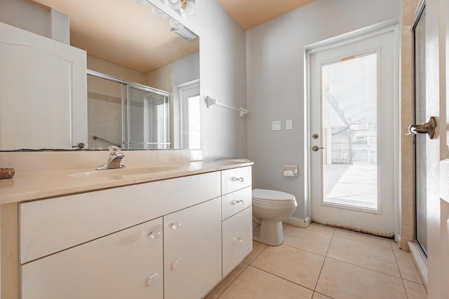1501 SW Kamchatka Ave, Port Saint Lucie, FL 34953 - full bathroom with a stall shower, vanity, and tile patterned flooring