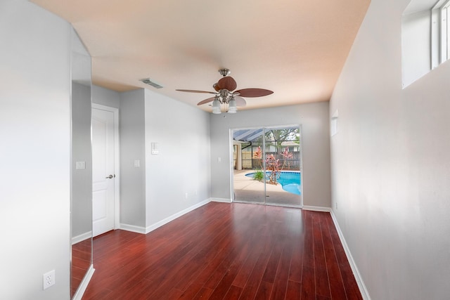 1501 SW Kamchatka Ave, Port Saint Lucie, FL 34953 - spare room with ceiling fan and wood finished floors