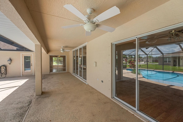 1501 SW Kamchatka Ave, Port Saint Lucie, FL 34953 - view of patio / terrace with ceiling fan, an outdoor pool, and a lanai