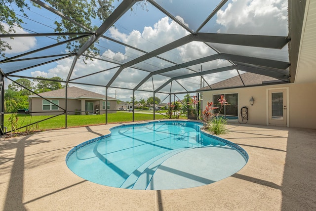 1501 SW Kamchatka Ave, Port Saint Lucie, FL 34953 - outdoor pool featuring a patio, a yard, and a lanai