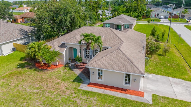 1501 SW Kamchatka Ave, Port Saint Lucie, FL 34953 - aerial perspective of suburban area