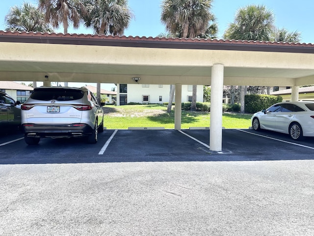 301 SW S River Dr Unit 206, Stuart, FL 34997 - view of covered parking lot