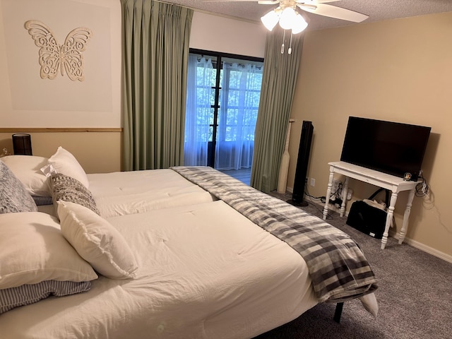 301 SW S River Dr Unit 206, Stuart, FL 34997 - bedroom featuring carpet, ceiling fan, a textured ceiling, and baseboards
