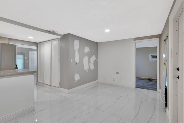 1112 S K St, Lake Worth Beach, FL 33460 - empty room with light marble finish floors, baseboards, and recessed lighting