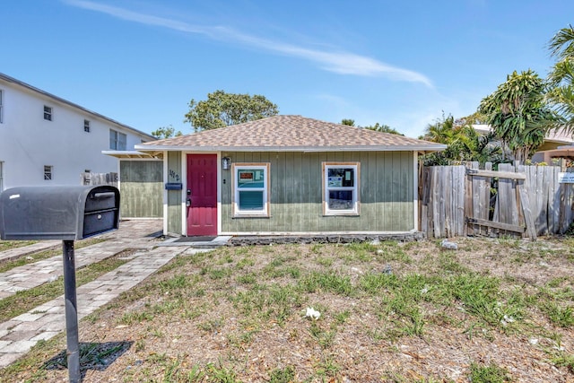1112 S K St, Lake Worth Beach, FL 33460 - view of front of house featuring roof with shingles