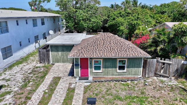 1112 S K St, Lake Worth Beach, FL 33460 - view of front facade with a shingled roof