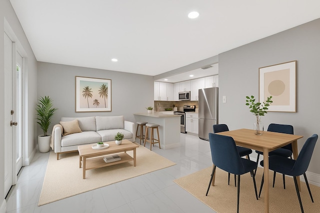 1112 S K St, Lake Worth Beach, FL 33460 - dining space with recessed lighting and baseboards