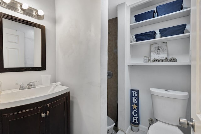 1112 S K St, Lake Worth Beach, FL 33460 - bathroom featuring vanity, toilet, and a stall shower
