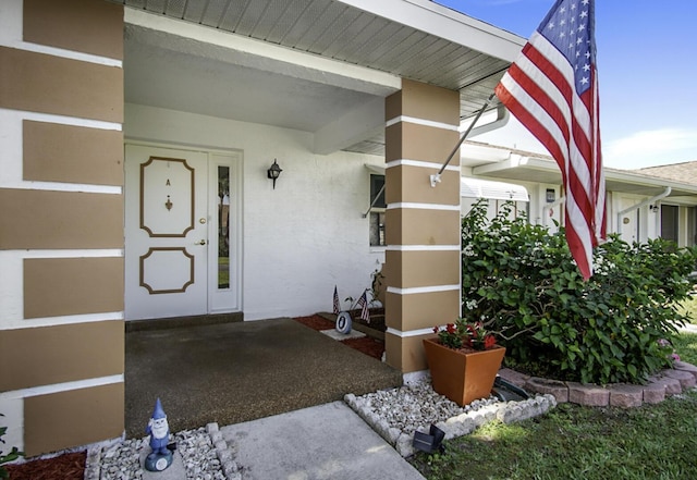 1233 S Lakes End Dr Unit A, Fort Pierce, FL 34982 - doorway to property with stucco siding