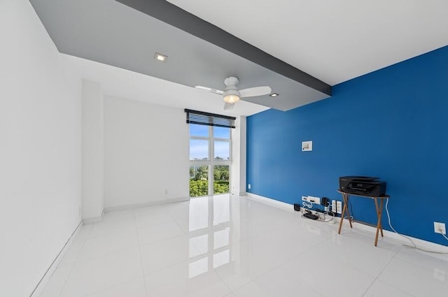 2200 S Ocean Blvd Unit 606, Delray Beach, FL 33483 - tiled empty room featuring ceiling fan and baseboards
