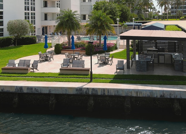 2200 S Ocean Blvd Unit 606, Delray Beach, FL 33483 - surrounding community with a gazebo and a patio