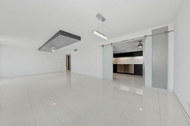 2200 S Ocean Blvd Unit 606, Delray Beach, FL 33483 - tiled empty room with a ceiling fan