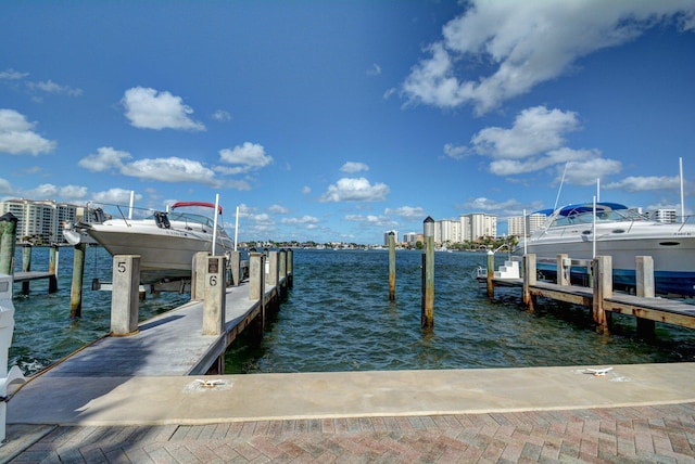 875 E Camino Real Unit 2G, Boca Raton, FL 33432 - dock area featuring a water view and boat lift